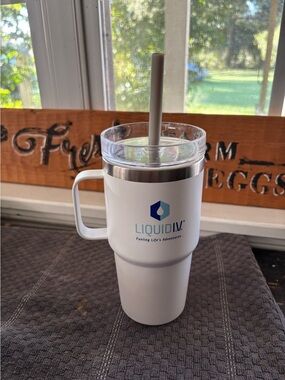 White Insulated Travel Mug with Handle Liquid I.V. Fueling Life's Adventures NNT